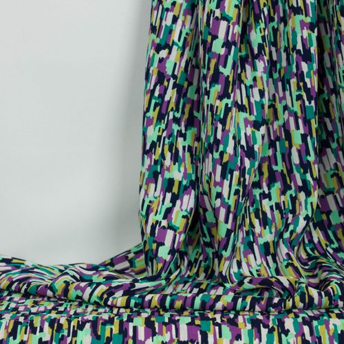 Polyester crêpe lila-groen patroon